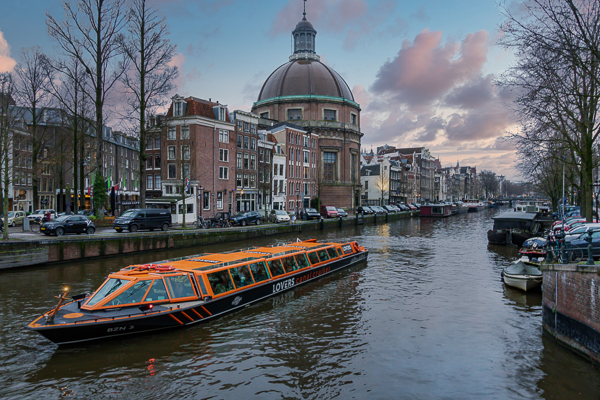 Amsterdam canals at dusk at the start of Rhine river cruise